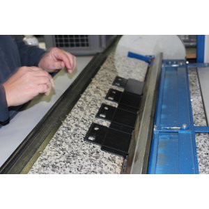 Flat Plastic Fabricated Enclosure Component Placed On Table Plastic fabrication enclosure Line Bending forming process